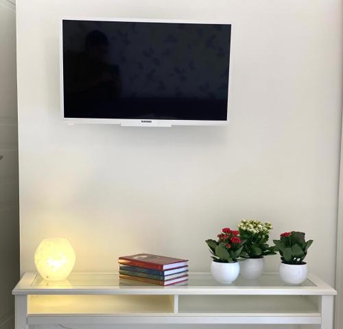 TV a/nebo společenská místnost v ubytování Dai 3 Santi