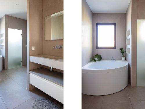 Koupelna v ubytování Villa sublime avec piscine chauffée, SPA et sauna à 10 min de la plage et des golfs - FR-1-791-19