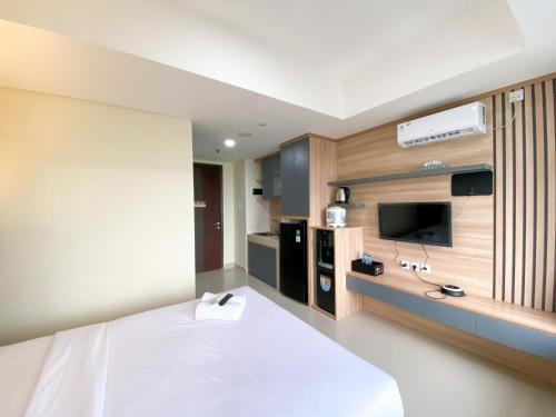 Postel nebo postele na pokoji v ubytování Minimalist Studio at Pollux Chadstone Apartment By Travelio
