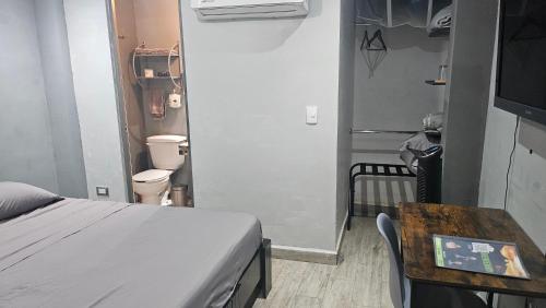 Postel nebo postele na pokoji v ubytování Agua Azul by tuhost