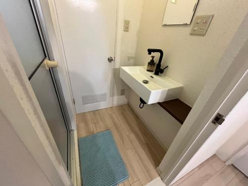 Bilik mandi di 広島Riverside house第3ひまわり503号室