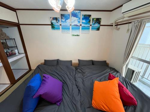 Katil atau katil-katil dalam bilik di 広島Riverside house第3ひまわり503号室