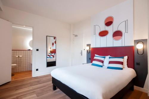Ένα ή περισσότερα κρεβάτια σε δωμάτιο στο Ibis Styles Rouen Centre Cathédrale