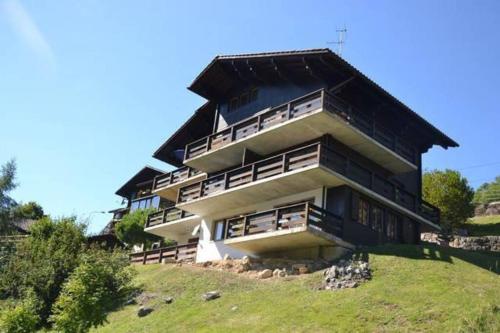 a large building on top of a hill at Chavonnes 21 in Gryon