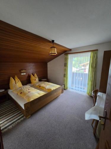 Postel nebo postele na pokoji v ubytování Haus Talblick