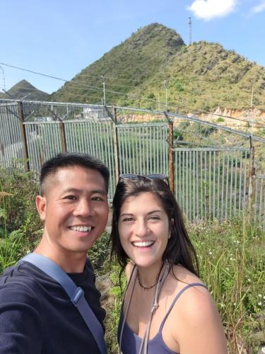 a man and a woman posing for a picture at Homestay field - bungalow, Ha giang loop tour, motorbikes rental in Ha Giang