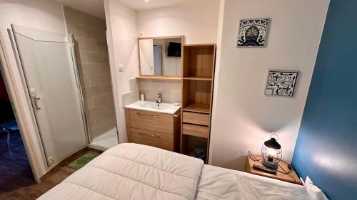 Posteľ alebo postele v izbe v ubytovaní Villa Blanche appartement 2