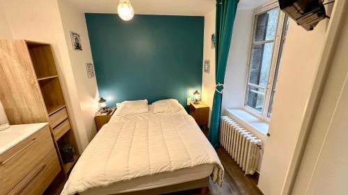 Posteľ alebo postele v izbe v ubytovaní Villa Blanche appartement 2
