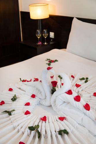 Edele Hotel Nha Trang Beachにあるベッド