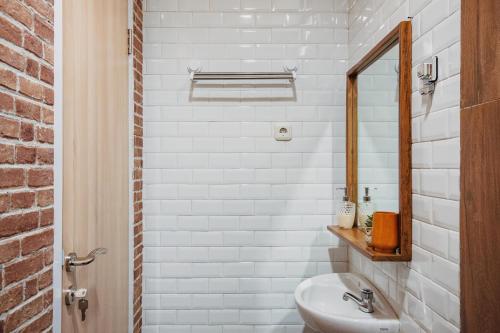 Ένα μπάνιο στο Calma Coliving at Bintaro, Tangerang Selatan