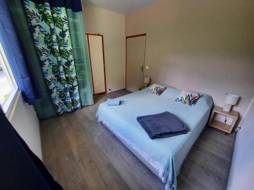 Postel nebo postele na pokoji v ubytování Fare JUANITA HOE