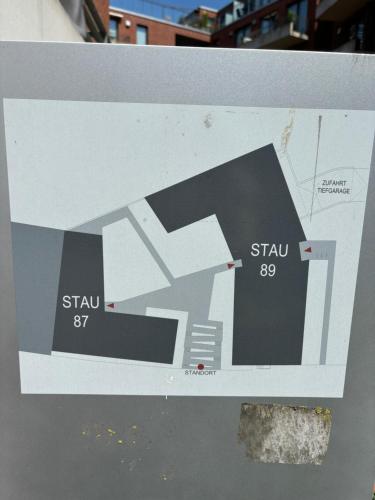 a sign with a picture of a building at Penthouse-Wohnung mit Flussblick in Oldenburg