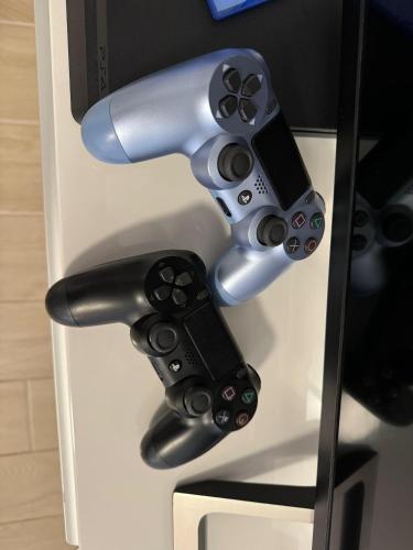 a nintendo wii game controllers and a video game console at Independent House a due passi dal Centro Storico in San Marino