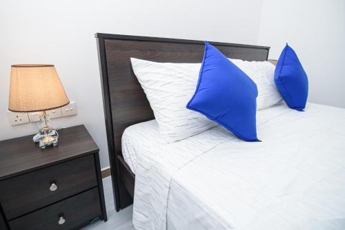 Postel nebo postele na pokoji v ubytování Royal Blu