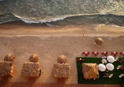 a group of teddy bears on a beach at Lancaster Eden Bay in Beirut