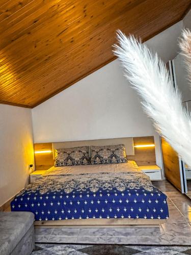 Ένα ή περισσότερα κρεβάτια σε δωμάτιο στο Casa di Mare - Sauna & Jacuzzi