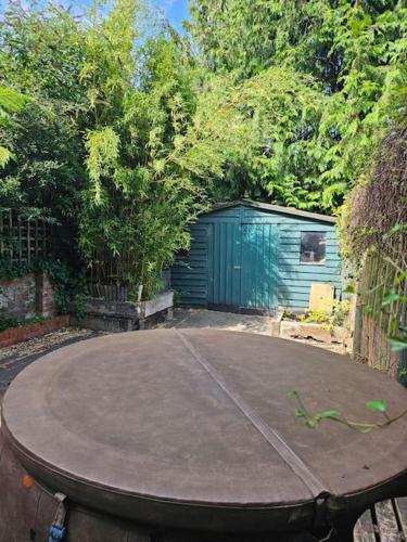 a basketball hoop in the middle of a yard at House in historic Winchester in Winchester