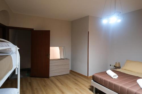 Katil atau katil-katil dalam bilik di Locanda de foris apartment