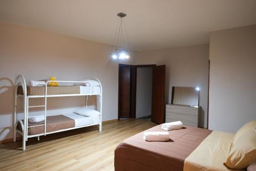 Katil atau katil-katil dalam bilik di Locanda de foris apartment