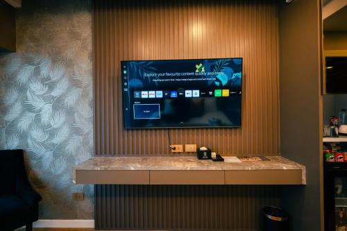 Televisyen dan/atau pusat hiburan di Bestier Hotel Hatyai