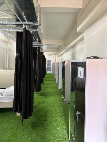 Ένα ή περισσότερα κρεβάτια σε δωμάτιο στο Radha Residency