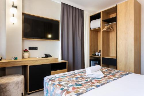 Voodi või voodid majutusasutuse AMAR Design Hotel by HMG toas