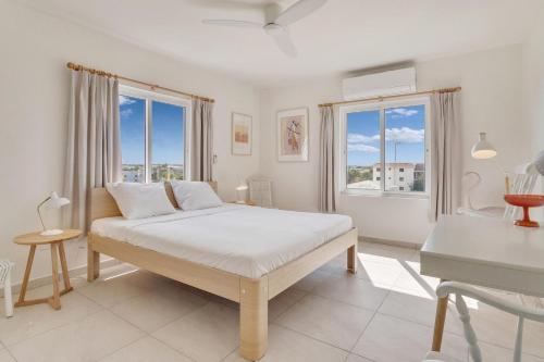 Ένα ή περισσότερα κρεβάτια σε δωμάτιο στο Playa Penthouse