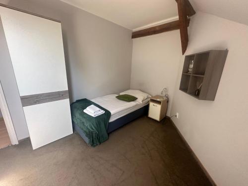 Postel nebo postele na pokoji v ubytování Star Apartman 6