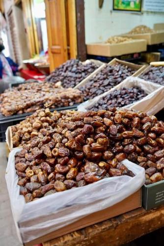 a display of different types of donuts on a table at Nabiloc Apart Hotel - Centre Ville in Fez