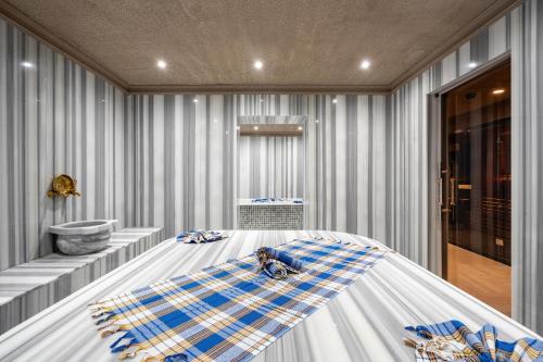 Salle de bains dans l'établissement Awen Lara Hotel