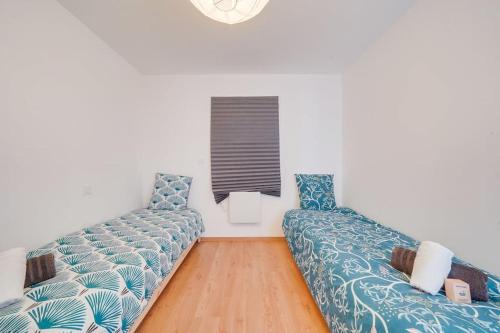 Ένα ή περισσότερα κρεβάτια σε δωμάτιο στο Maison neuve à proximité immédiate de St Emilion