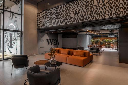 Posezení v ubytování Way Tambaú - Studios Deluxe em João Pessoa por Carpediem