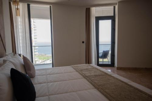 Cama o camas de una habitación en Best View Fortina Luxury Suites