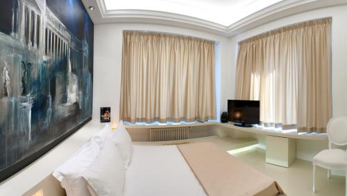 ローマにあるBdb Luxury Rooms San Pietroのリビングルーム(ソファ、テレビ付)