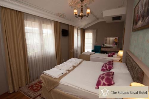 Gulta vai gultas numurā naktsmītnē Sultans Royal Hotel