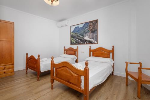 Postel nebo postele na pokoji v ubytování Casa Rural Entrecaminos