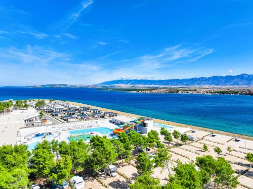 an aerial view of the resort and the water at Aminess Style Glamping Villas & Holiday Homes Avalona in Povljana