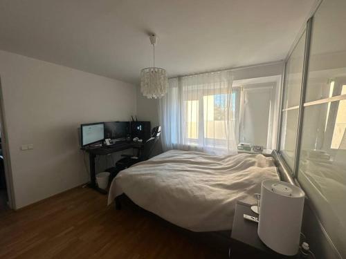 Ένα ή περισσότερα κρεβάτια σε δωμάτιο στο Apartment near Stroomi beach