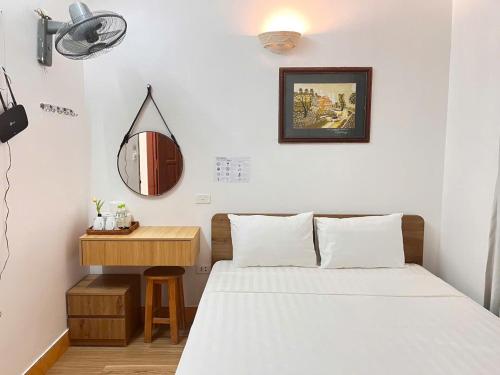 Postel nebo postele na pokoji v ubytování fortuna homestay