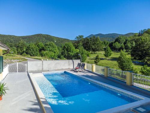 a swimming pool on top of a house at Holiday Home Saulja by Interhome in Sveti Juraj