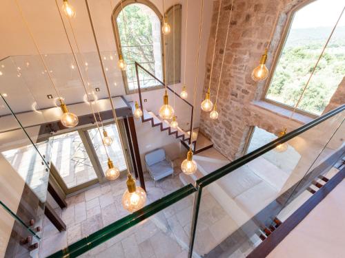 an overhead view of a staircase in a house with lights at Holiday Home Oasi di benessere Bio by Interhome in Sassofortino