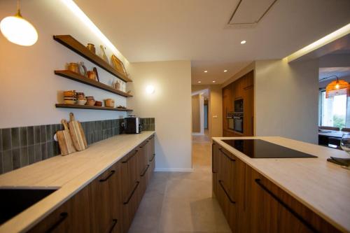 Η κουζίνα ή μικρή κουζίνα στο Villa vue mer Cap Corse