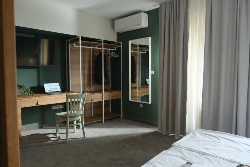 Ένα ή περισσότερα κρεβάτια σε δωμάτιο στο Family Hotel Ramira