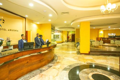 Parrot Hotel Arushaのロビーまたはフロント