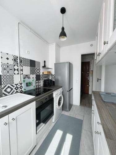 Η κουζίνα ή μικρή κουζίνα στο Appartement - Fresnes