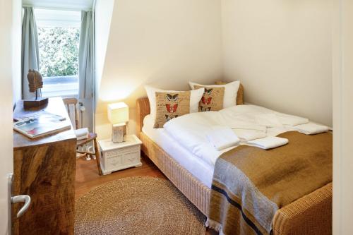 Postel nebo postele na pokoji v ubytování Sonnenhüs