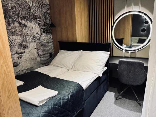 Posteľ alebo postele v izbe v ubytovaní Gdańsk Nadmotławie Apartments City Centre Sauna & Gym