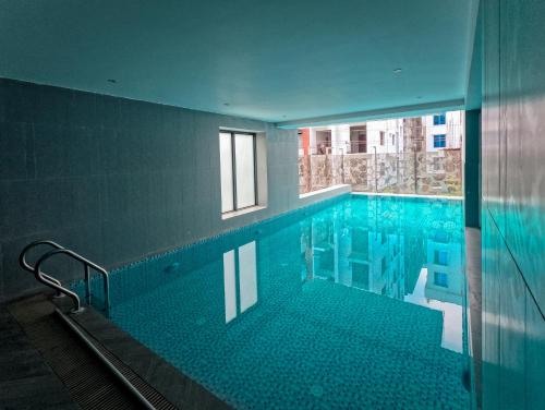 Bazén v ubytování Poolside Villa nebo v jeho okolí