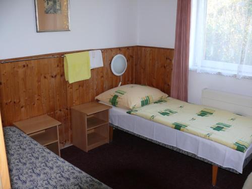 Postel nebo postele na pokoji v ubytování Penzion Dana Troja