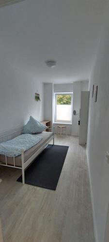 Ένα ή περισσότερα κρεβάτια σε δωμάτιο στο Ferienwohnung Gertraude